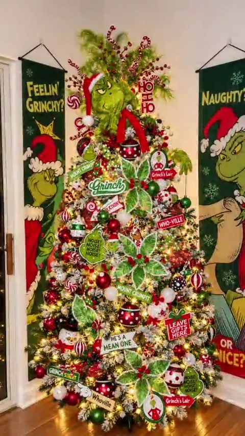 Whimsical green and red character-themed Christmas tree